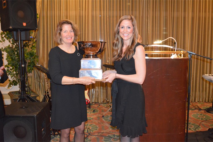 Mary Packer accepts cup from Co-Chair Julie Bolger 