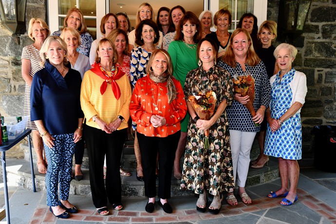 Auxiliary Members along with President Carolyn Slota (in green) welcome new members.