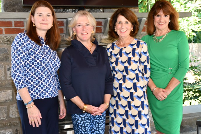 Officers of The Auxiliary Phyllis Hart Vice President, Robin Conicella Past President, Chris Ostrander Treasurer, and Carolyn Slota President, paused for photo at the annual luncheon.