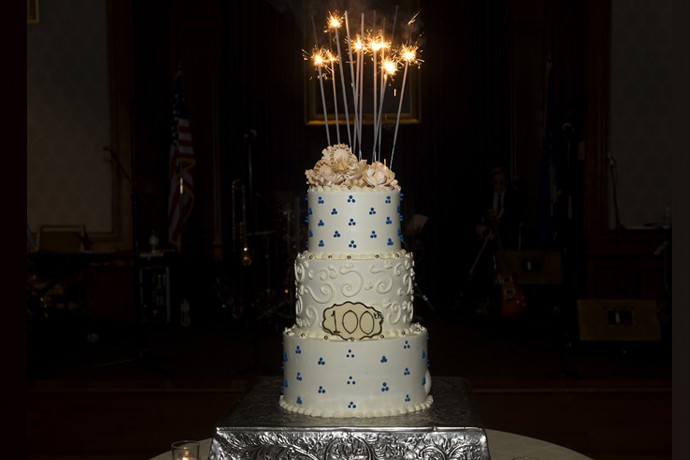The 100th Year Anniversary Cake after being lit