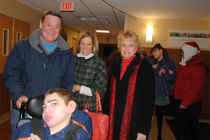 Jack and his father are accompanied by Ellen Cass and Marti Rodgers to enjoy the day